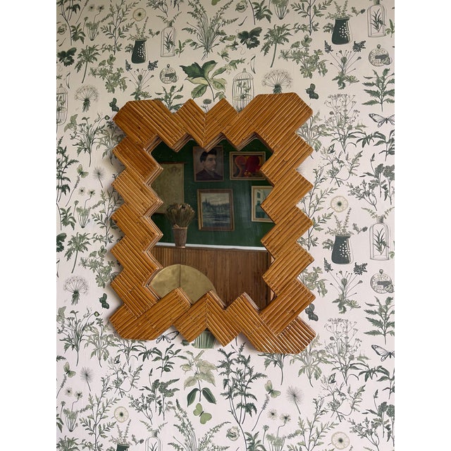 Transform your living space into a stylish oasis with this Vintage Style Rattan Cane Wall Mirror. Crafted by skilled...