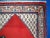 Vintage handmade Indian rug from the end of 20th century. The rug is in original good condition in red and beige wool....