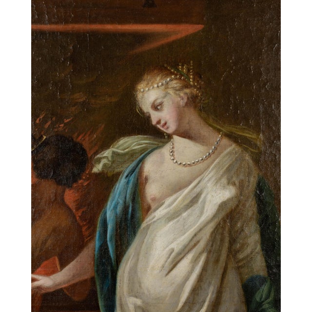 An 18th century French Louis XVI style trumeau mirror with a large painting depicting Thetis at the Forge of Hephaestus...