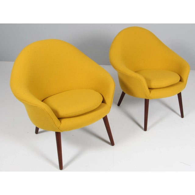 Hans Olsen. Pair of lounge chairs new upholstered with yellow Hallingdal from Kvadrat. Legs of teak. Made in the 1960s....