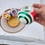 Mid-Century Modern 1990s Kurt Adler Style Colorful Reflector Striped Ornaments- Set of Three For Sale - Image 3 of 9