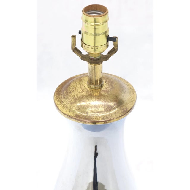 Pair of chrome and brass vase shape Mid-Century Modern table lamps.