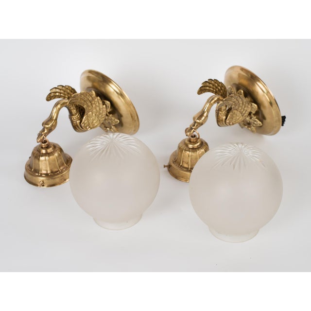 Brass 1950s Spanish Empire Chased Brass Swan Wall Sconces With Starburst Frosted Globes - A Pair For Sale - Image 8 of 13