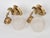 Brass 1950s Spanish Empire Chased Brass Swan Wall Sconces With Starburst Frosted Globes - A Pair For Sale - Image 8 of 13