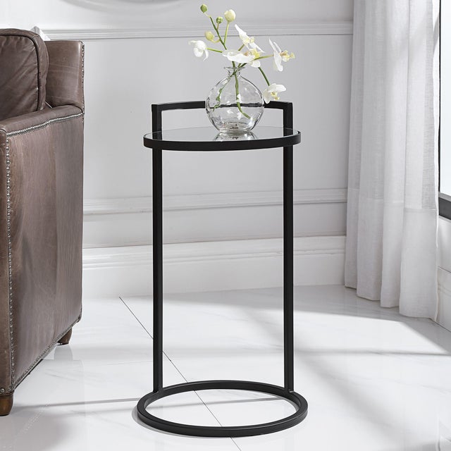 This iron accent table with a mirrored top, will be perfect beside your favorite chair. Finished in a matte black, it will...