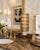 This vintage Hollywood Regency Dixie cup dispenser is a striking piece of midcentury vanity decor, finished in a luxe gold...