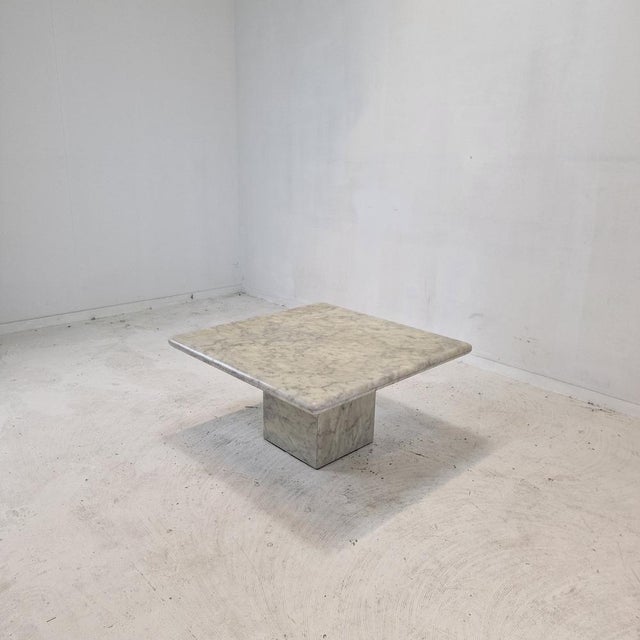 Very nice Italian coffee table, fabricated in the 1980s. It is handcrafted out of very beautiful Carrara marble. The...