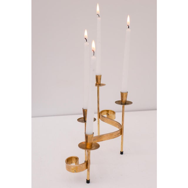 A vintage candlestick holder designed by Gunnar Ander in the 1960s and produced by Ystad Metal in Sweden. The shape is...