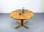 A truly unique dining table with a flower-shaped round top that can be extended to almost 300 cm using its four extension...