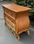 This handsome seagrass and rattan vintage dresser has great detail and style. It’s a bit more fancy than your usual rattan...