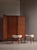 Elegant pair of Scandinavian Modern stools dating to the 1950s Denmark, featuring sculptural tripod legs in richly grained...