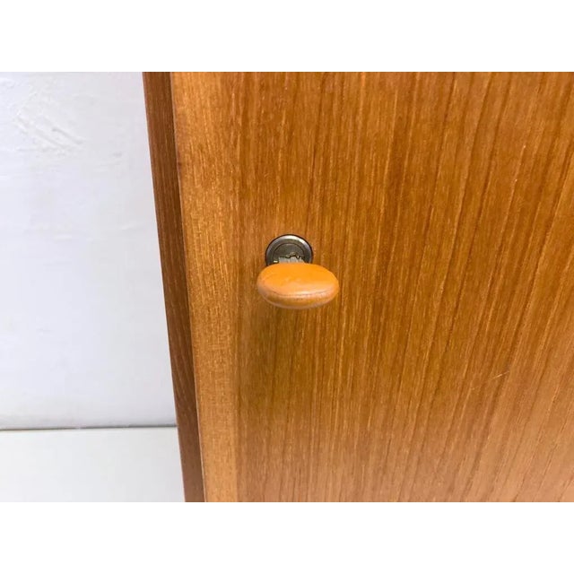 Stehrgal from the 1960s. Teak, veneered and massive. Good used condition. Light wear. 185 x 61 x 43 cm. This piece has an...