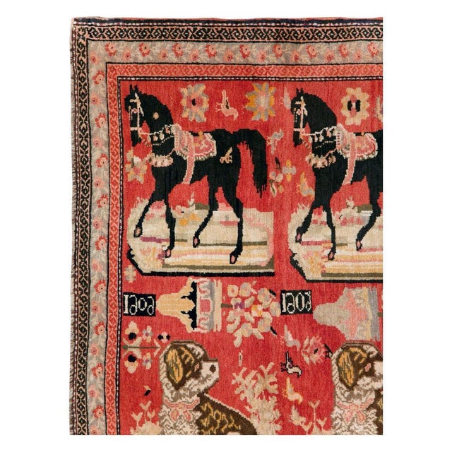 An antique Caucasian 'Atly Itli (horse and dog)' Karabagh pictorial accent rug handmade during the early 20th century....