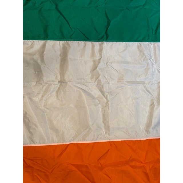 This is a Late 20th century vintage Irish flag. It has green, white, and orange stripes. The green represents the Irish...