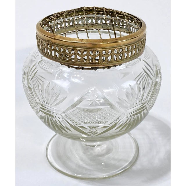 Vintage clear hand cut glass vase with decorative fan and diamond motif on pedestal base. Top features removable brass...