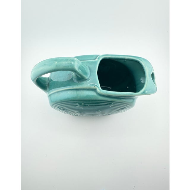 Lovely vintage Shawnee pottery pitcher. Hard to find. Stars and Stripes collection. Teal coloring. Reminiscent of fiesta...