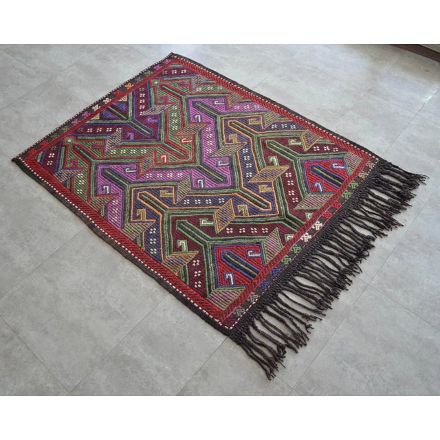 Dimensions: 45" x 56" or 3'9" x 4'8" Excluding fringe Material : Made of wool on goat hair Condition: Rug is in Very Good...