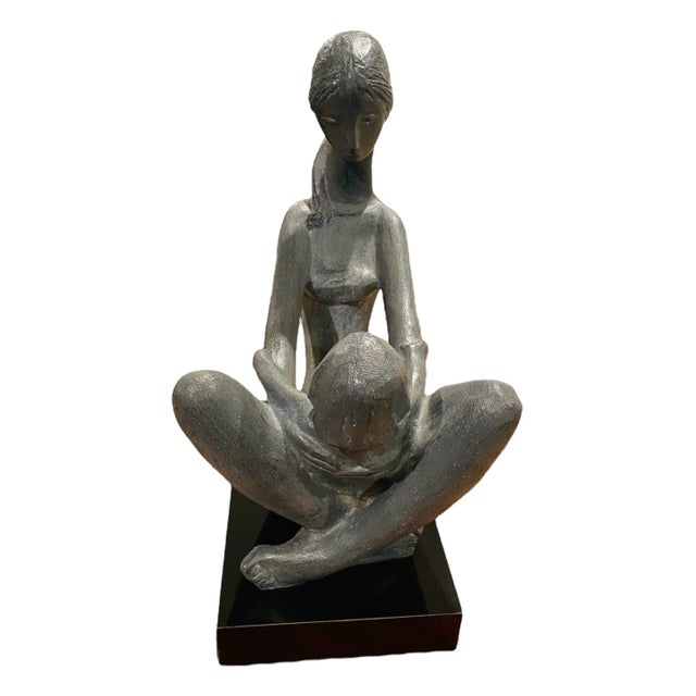 A beautiful expression of quintessential mid century style by Hungarian born sculptor Kathy Klein. Titled 'Generations',...