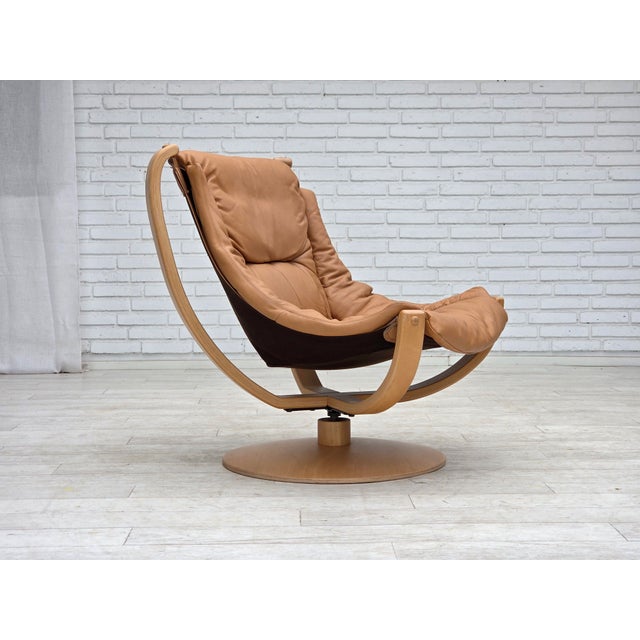 1980s, Scandinavian swivel armchair. Original light brown furniture leather, canvas, bent beech wood, bent beech wood...