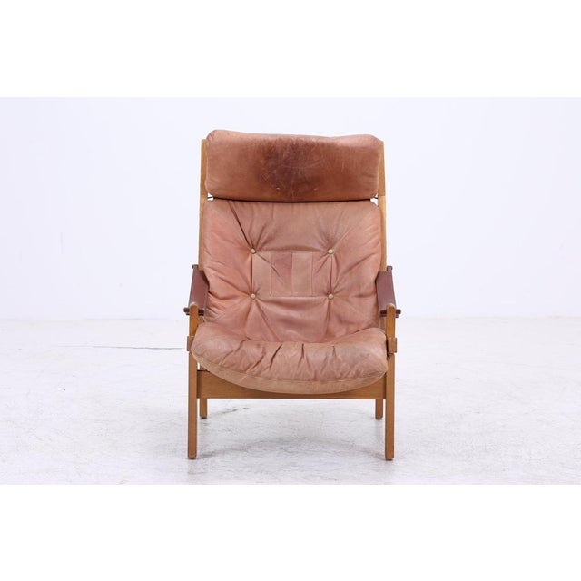 Original Hunter Chair by Torbjørn Afdal from Norway. This design is among the most iconic Scandinavian armchair designs of...