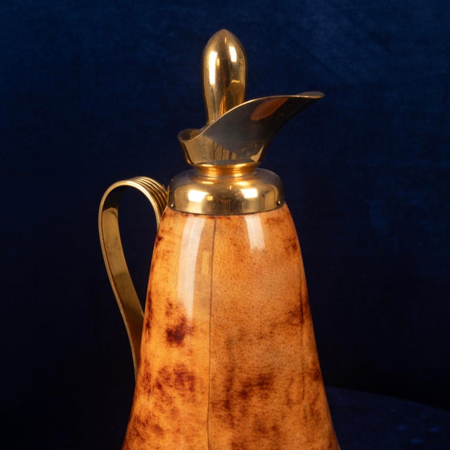 Overview a striking thermos produced by macabo of cusano milanino, italy, circa 1950s, featuring a sculptural, faceted...