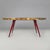 Italian modern oval dining table in parchment with red lacquered wood legs 1970s Dining table with oval top covered in...