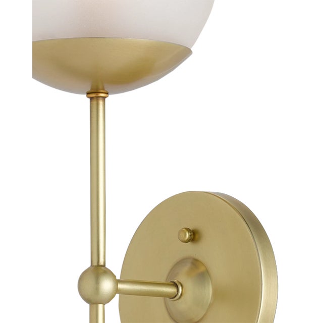 A special design attribute of the Montview Wall Sconce is its long stem holding its frosted glass globe in place. Made of...