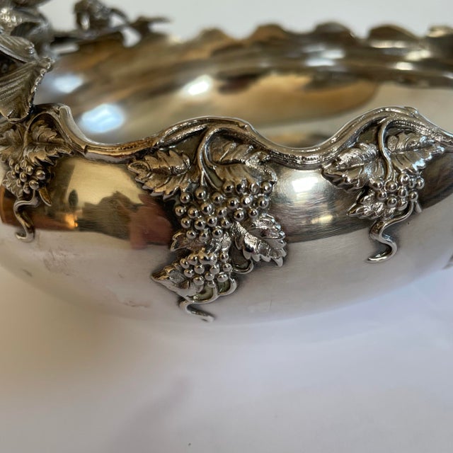 A antique silver plated nu dish by E.G.Webster and Sons. The bowl features a detailed squirrel figure perched on a branch...