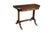 This elegant multi-functional Regency style game table was crafted around the turn of the 20th century. The structured...