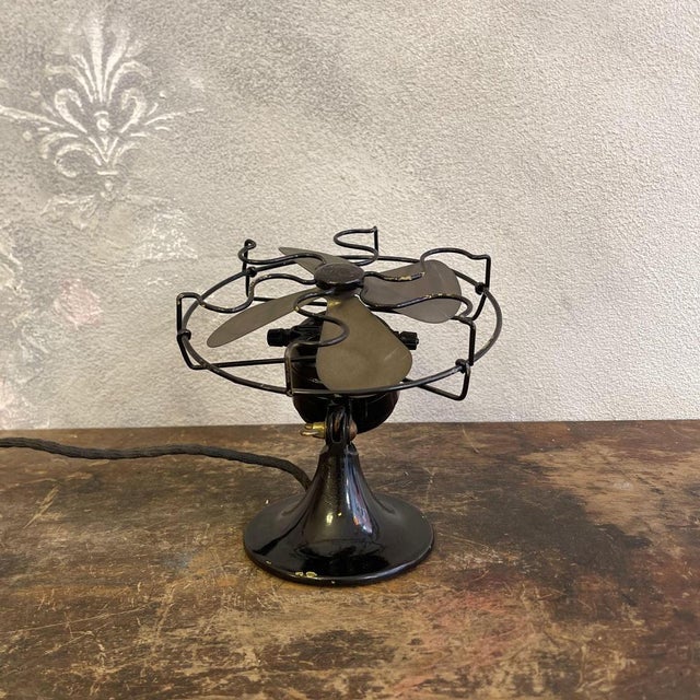 This 1930s table fan, manufactured by the compagnia generale di elettricità (cge) in milan, is a classic example of...