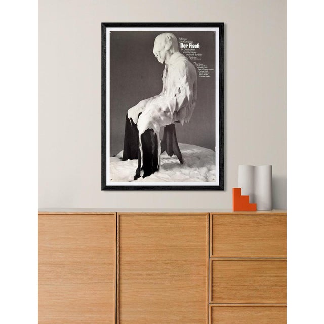 The Piece This striking black and white vintage poster was created for the production of "Der Fisch" at the Tübinger...
