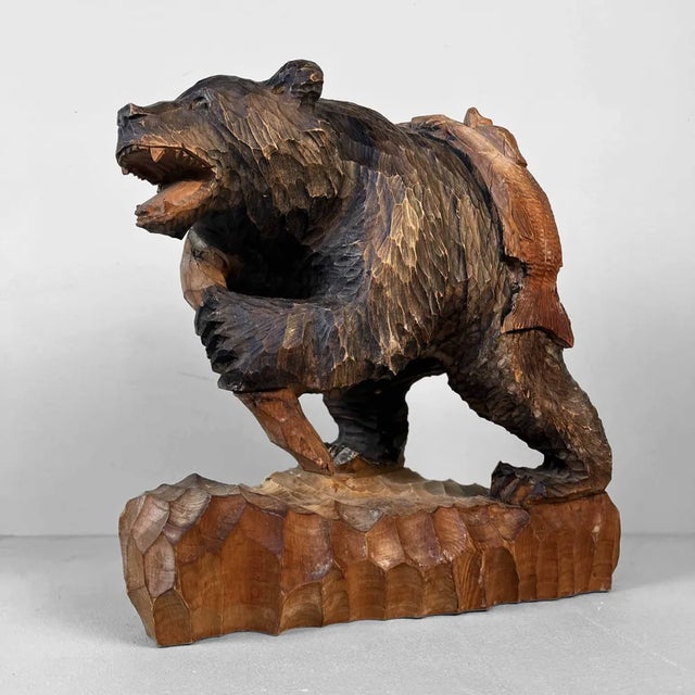 Hand-carved wooden bear (Kibori Kuma). Typical carving of the indigenous Japanese people, the Ainu. This bear is depicted...