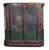 English walnut wood showcase with a bowfront silhouette. Elegant curved lines and beveled edges on the glass panes...