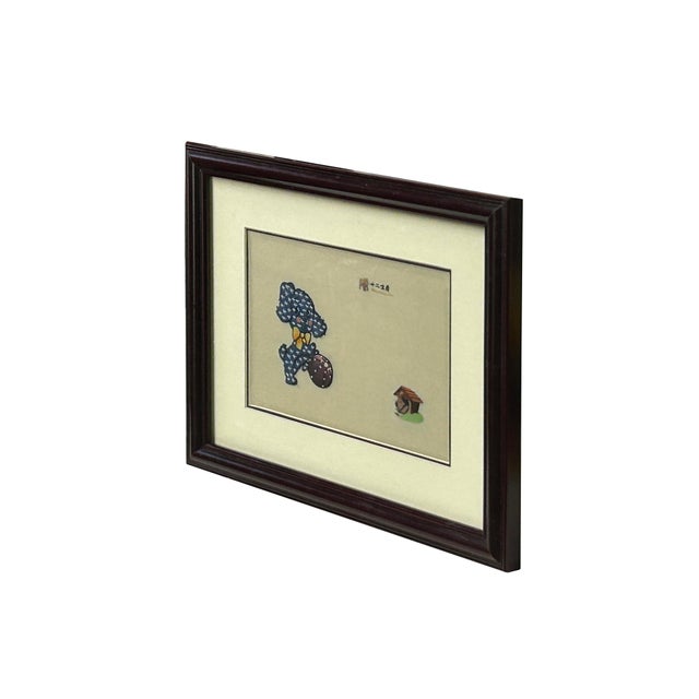 This charming framed artwork features a whimsical, mid-century-style depiction of a puppy, rendered with intricate...