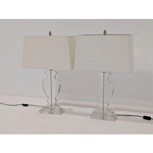 Elegant and timeless, the andrew martin faraday table lamps embody refined modern luxury. Each lamp features a sculptural...