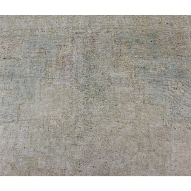 Textile Mid 20th Century Vintage Turkish Oushak Rug With Understated Design and Muted Tones For Sale - Image 7 of 10