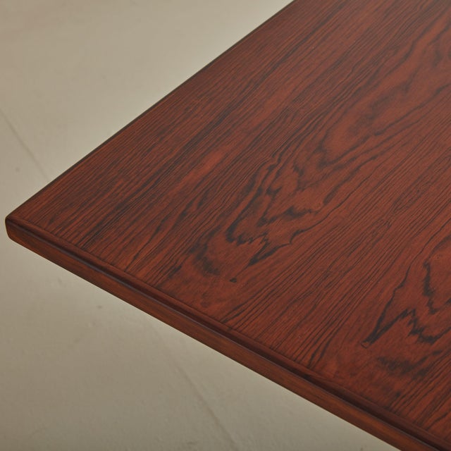 A gorgeous 1960s Danish Modern extendable dining table attributed to Hans Wegner for Johannes Hansen Cabinetmakers. This...