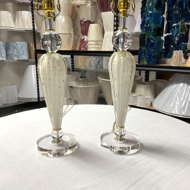 Add timeless elegance to any room with this beautiful matching pair of Venetian glass table lamps. Featuring sculpted...
