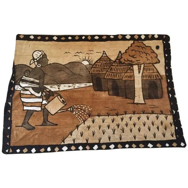 Korhogo handspun, handwoven and hand-painted cotton mud cloth by the women of the Korhoga Tribe who spin the cotton, while...