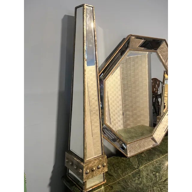 A Hollywood Regency Octagonal Silver & Gold Gilt Mirror and a Pair of Trapezoidal Silver & Gold Gilt Mirror Obelisks,...
