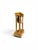 An elegant miniature French Empire-period portico clock crafted in bronze doré. The architectural case features four...