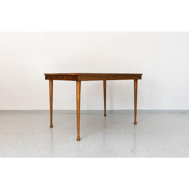 Dining Table by Marian Grabiński, Piotrkowskie Fabryki Mebli, Poland, 1960s This extendable dining table has been fully...