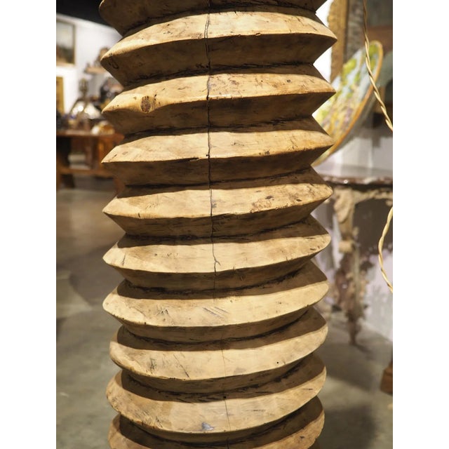 Dating to the 1600s, this French wine press screw has been repurposed into a very unique floor lamp. Based on the size of...