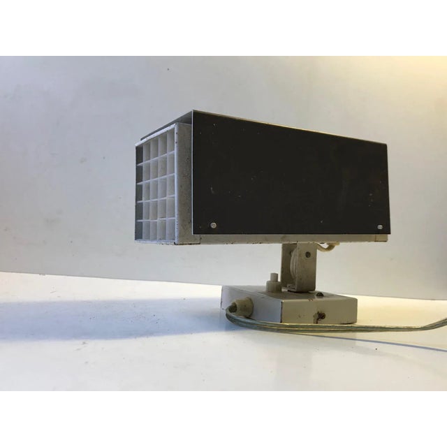 A rare wall light in characteristic color scheme of Preben Dahl: Grey and white. it's made from powder coated metal and...