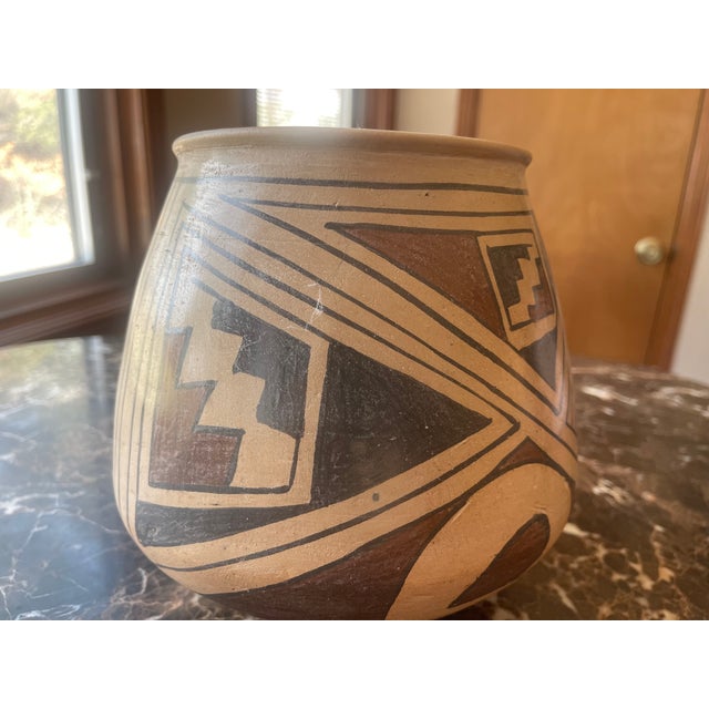 Traditional Ceramic Pottery - round pot with Native American Aesthetic by Manuel Olivas. Style is 'Mata Ortiz polychrome'....