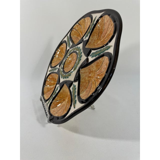 A beautiful hand painted French Faience Oyster Plate made by the French pottery workshop of Saint Jean de Bretagne in...