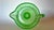 This piece is a Beautiful vintage uranium green glass juice reamer, produced by the Indiana Glass Company during the...