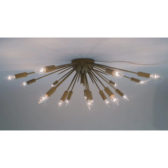 Original wired. Function tested. The lamp is executed with 19 x E14 Edison screw fit bulbs. It is wired and in working...