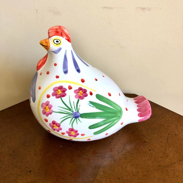 A pair of mid century faience hand painted pottery roosters. Made in Italy.