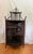 Beautiful and unique, this antique English Aesthetic Movement corner shelf or etarge can be set on top of another piece or...